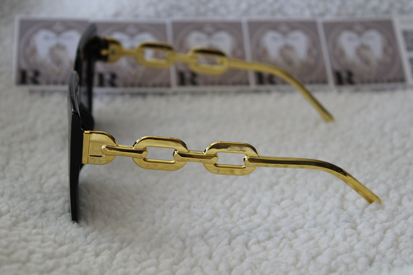 Sunglasses black gold color on side