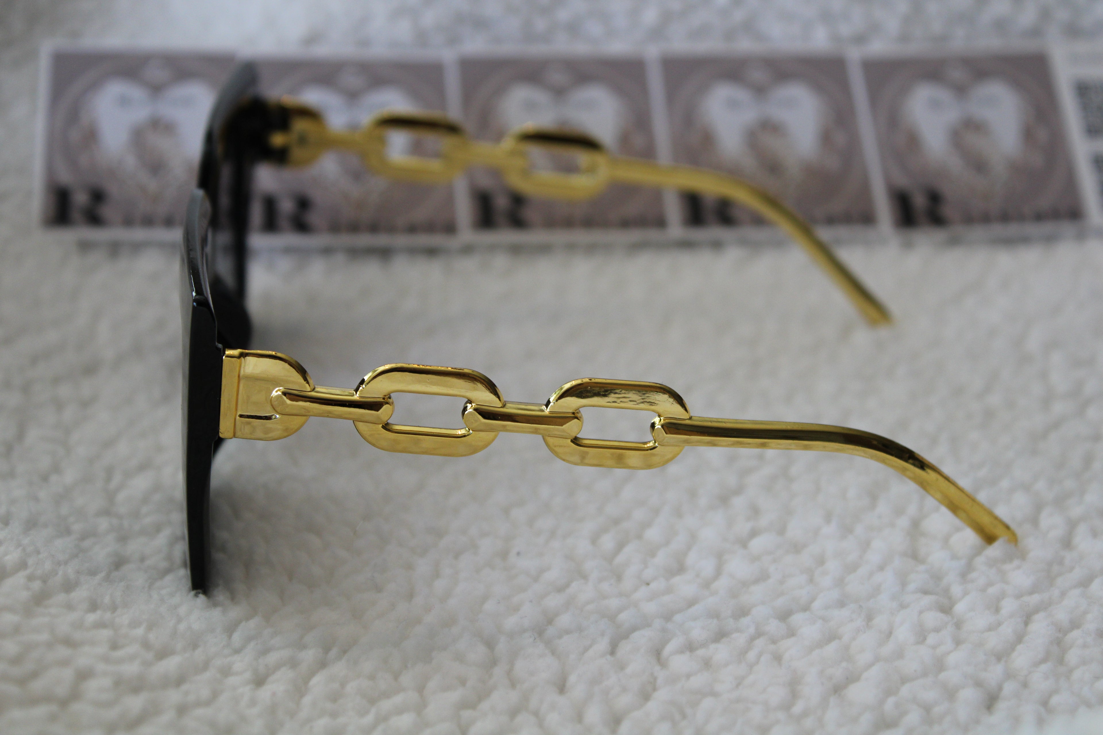 Sunglasses black  gold color on side